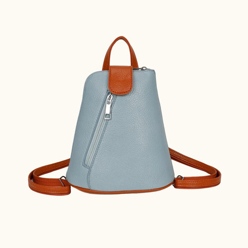 Light blue backpack with brown leather accents on a white background