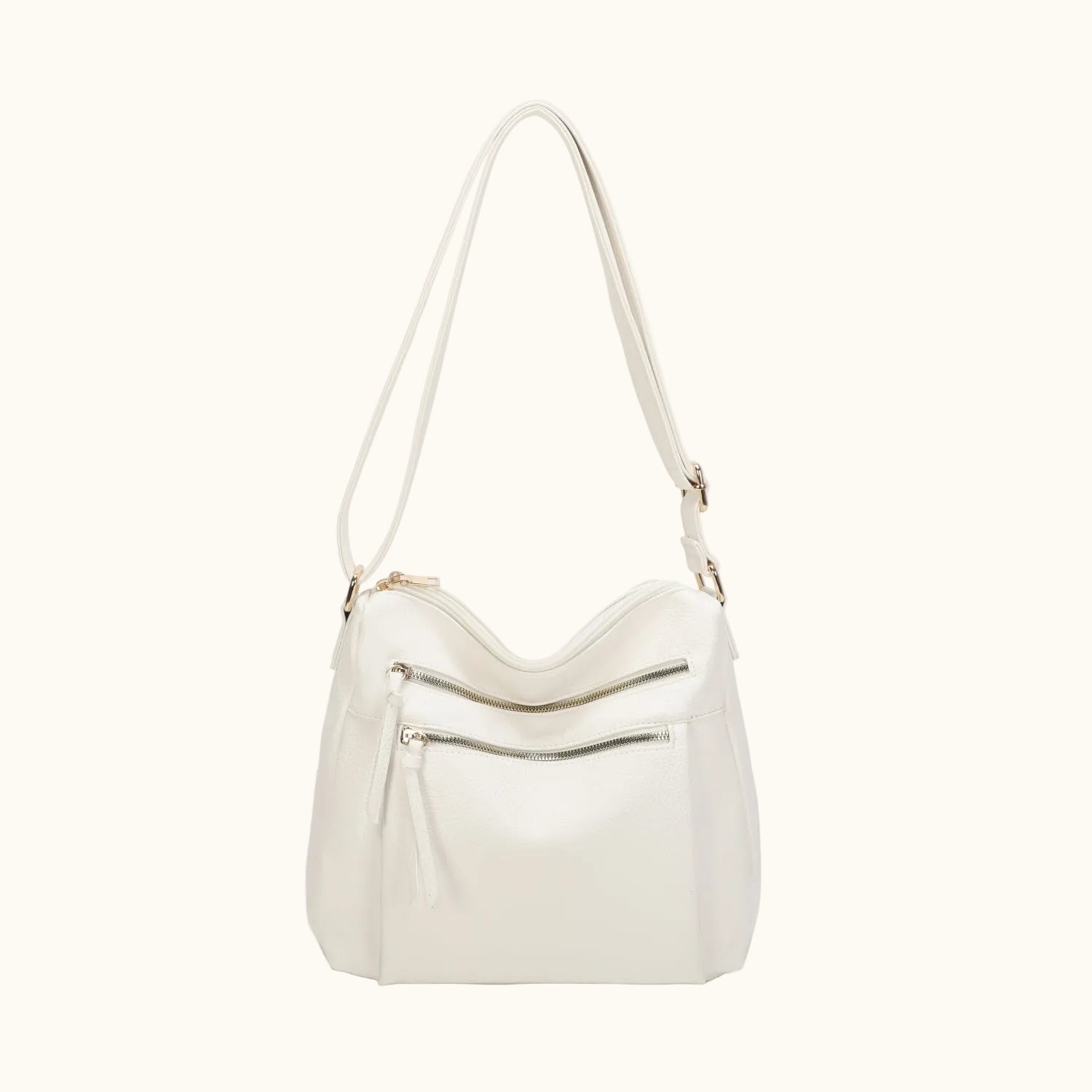 White handbag with a shoulder strap on a white background