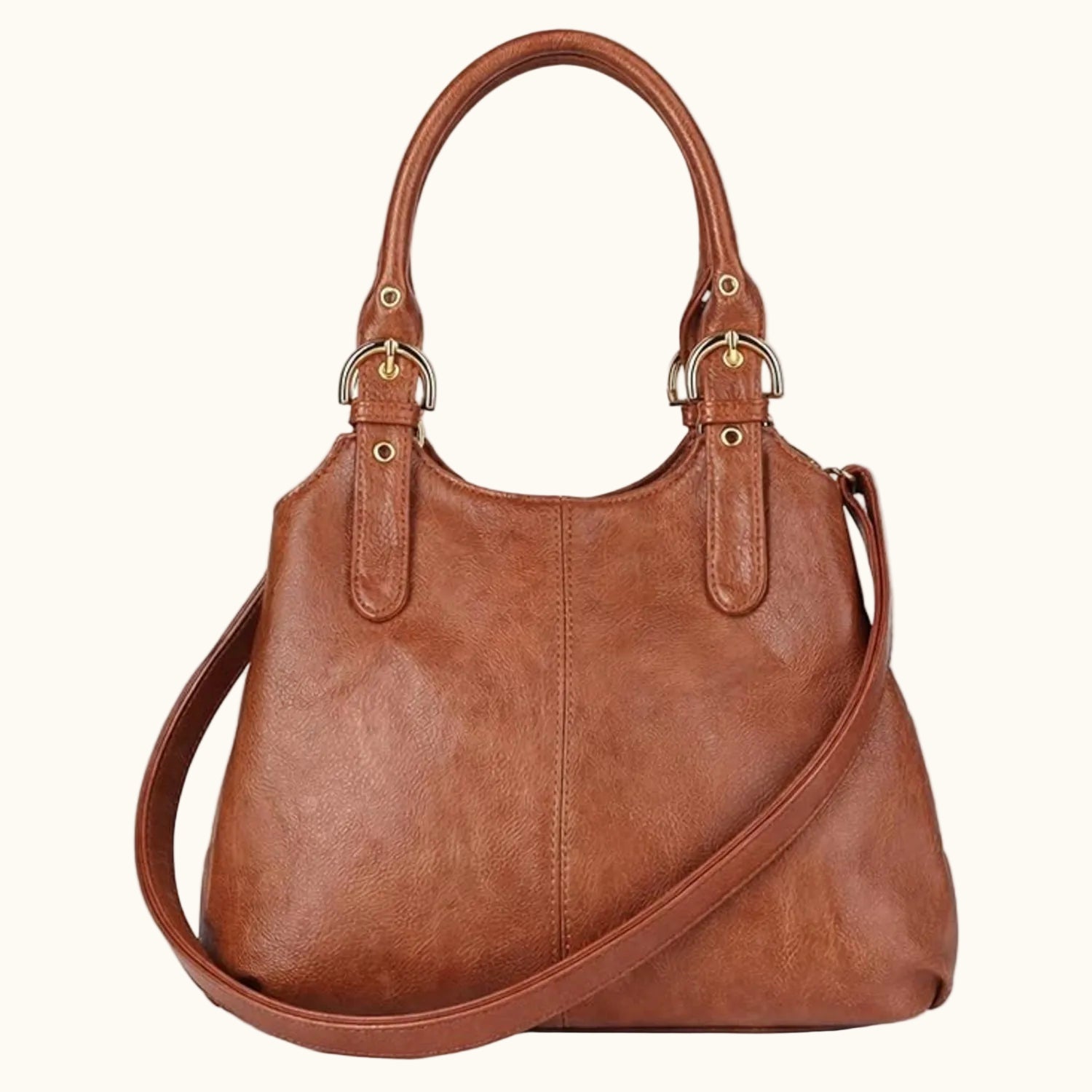 Brown leather handbag with a shoulder strap on a white background