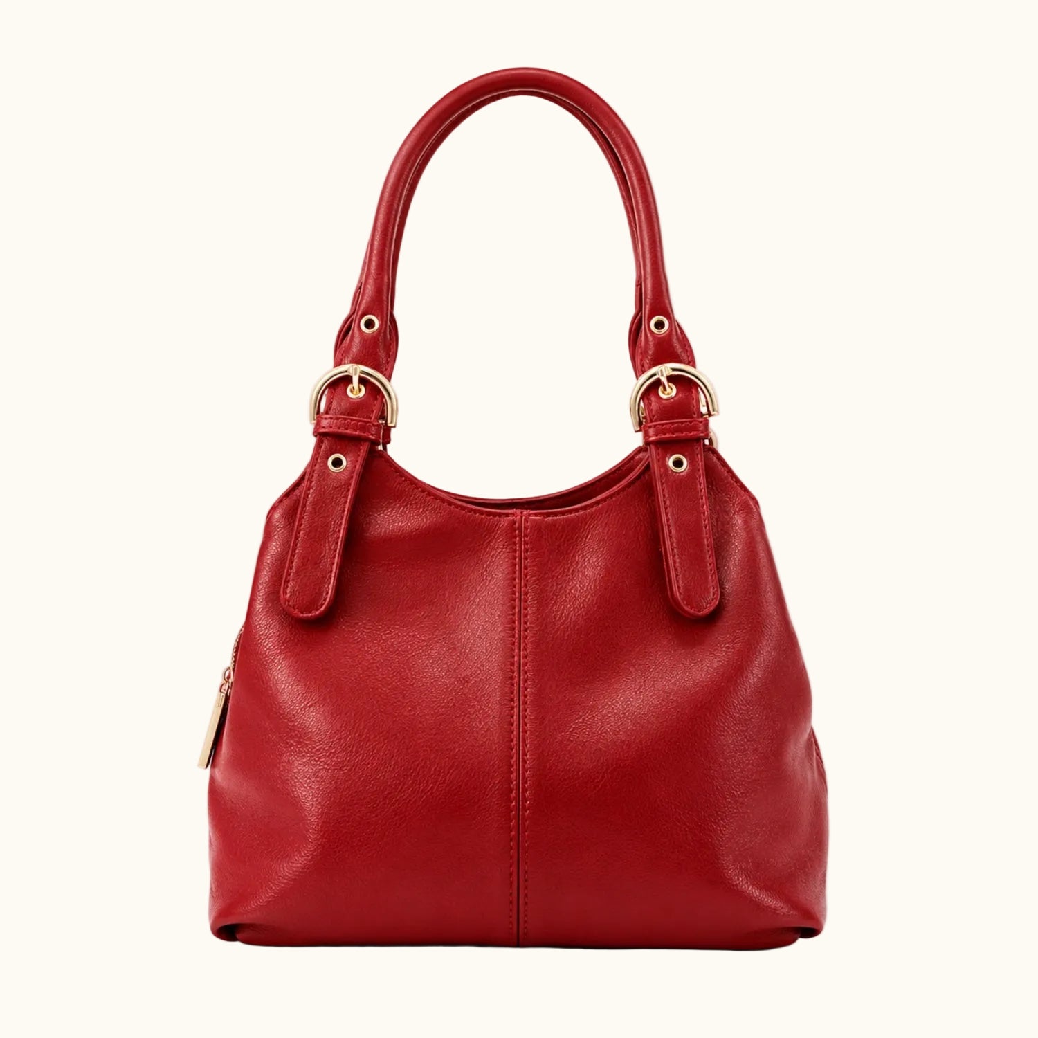 Red handbag with gold accents on a white background