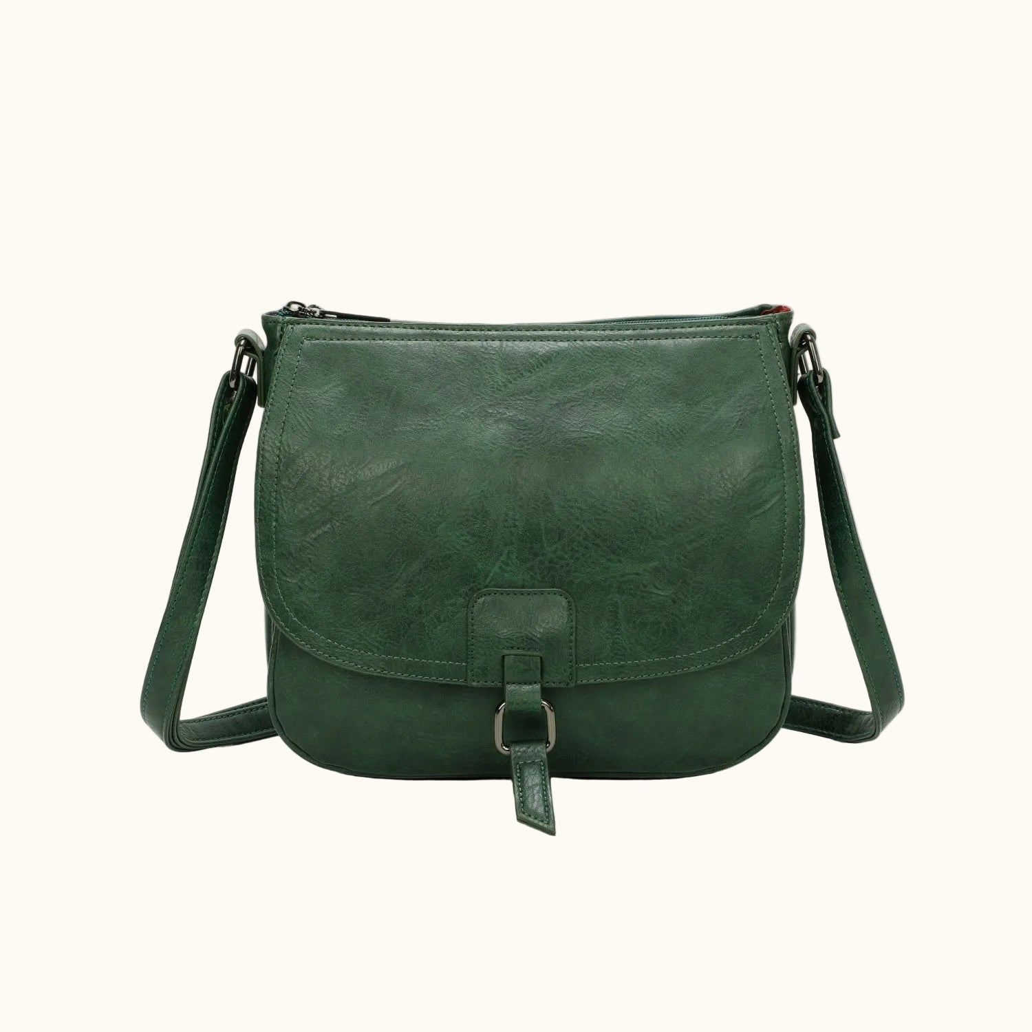 Green leather shoulder bag on a white background