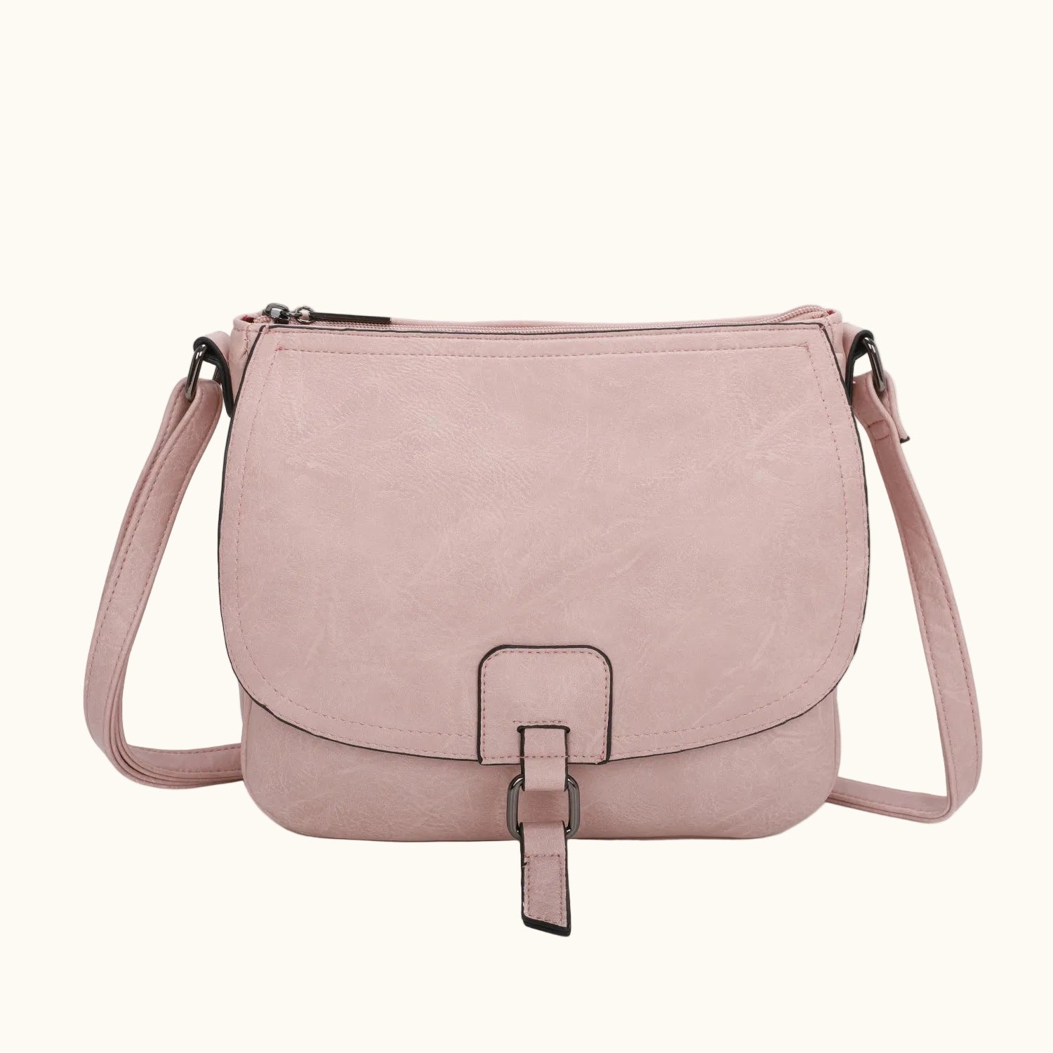 Pink crossbody bag on a white background