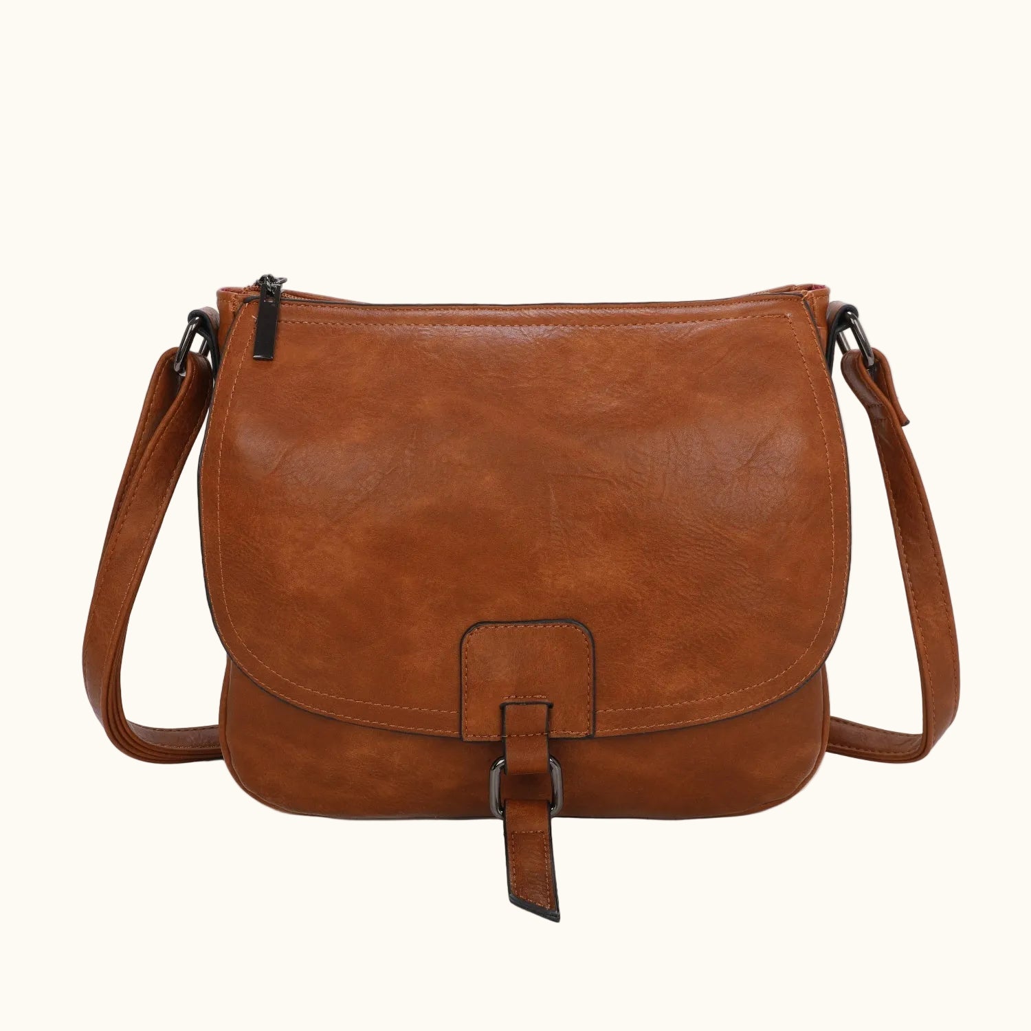 Brown leather shoulder bag on a white background