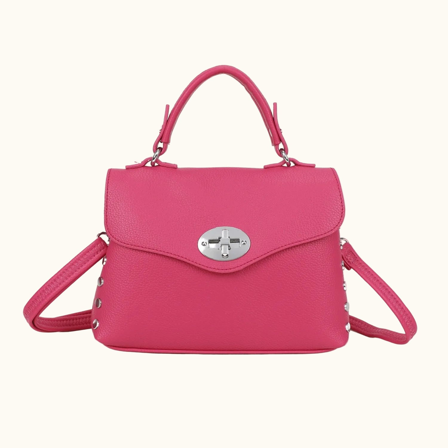 Pink handbag with a silver clasp on a white background