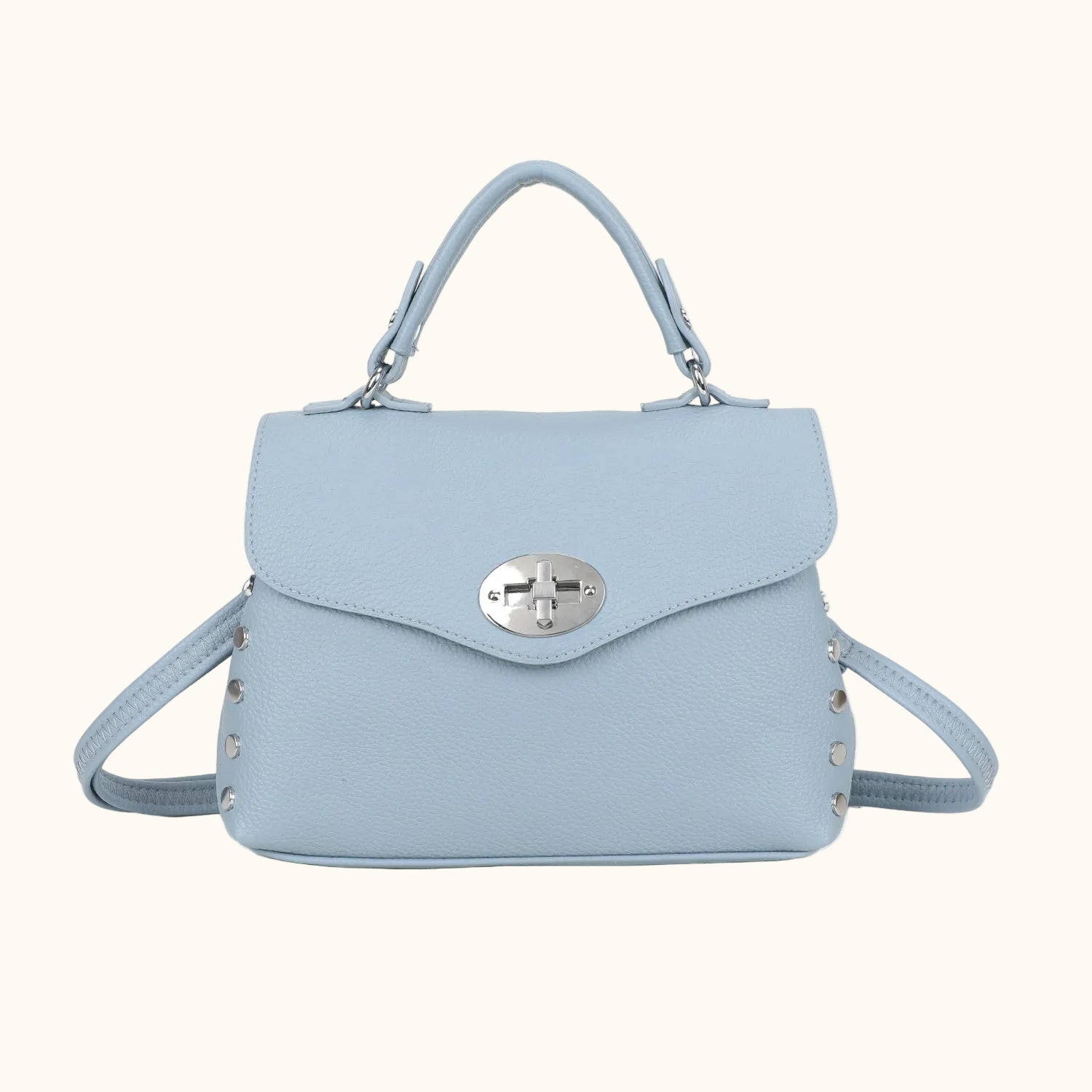 Light blue handbag with a silver clasp on a white background