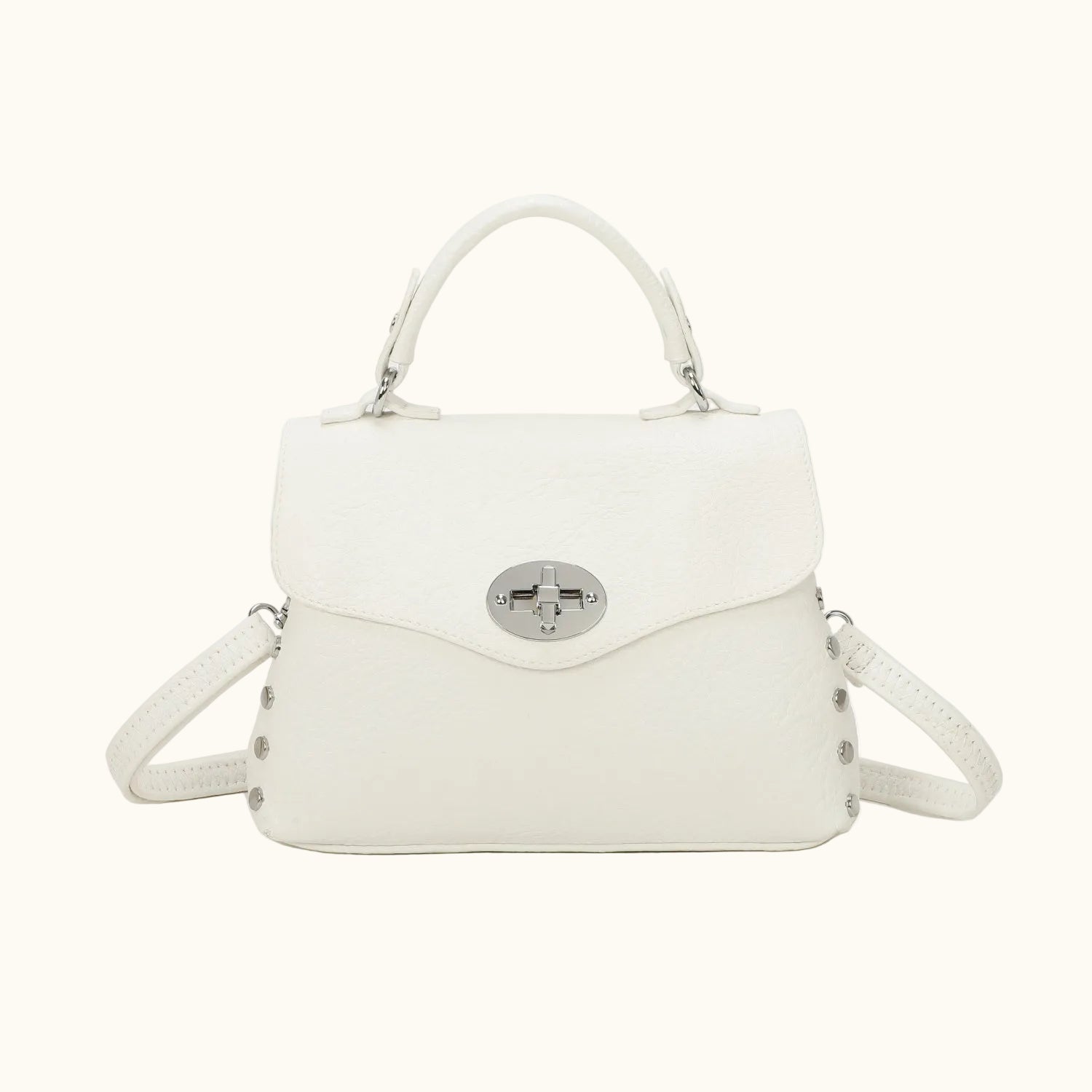 White handbag with a silver clasp on a white background