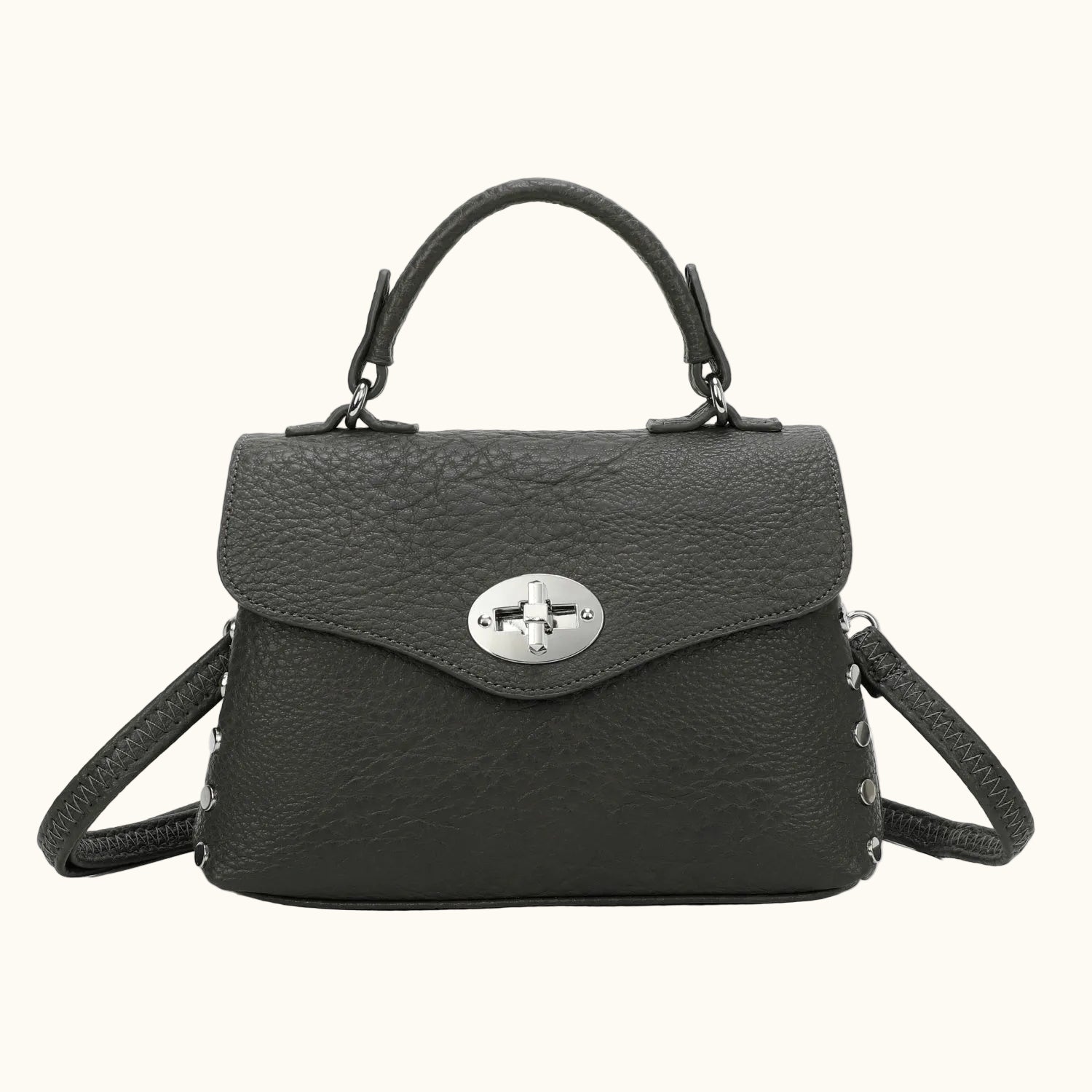 Black handbag with a silver clasp on a white background