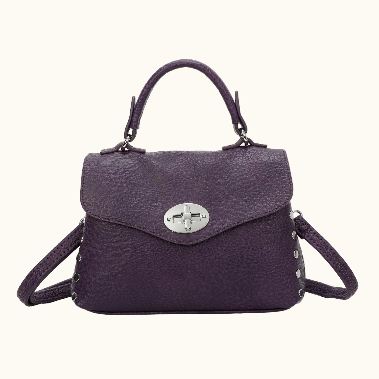 Purple handbag with a silver clasp on a white background