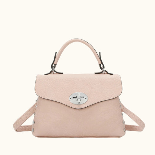 Pink handbag with a silver clasp on a white background