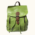 Green leather backpack with brown accents on a white surface