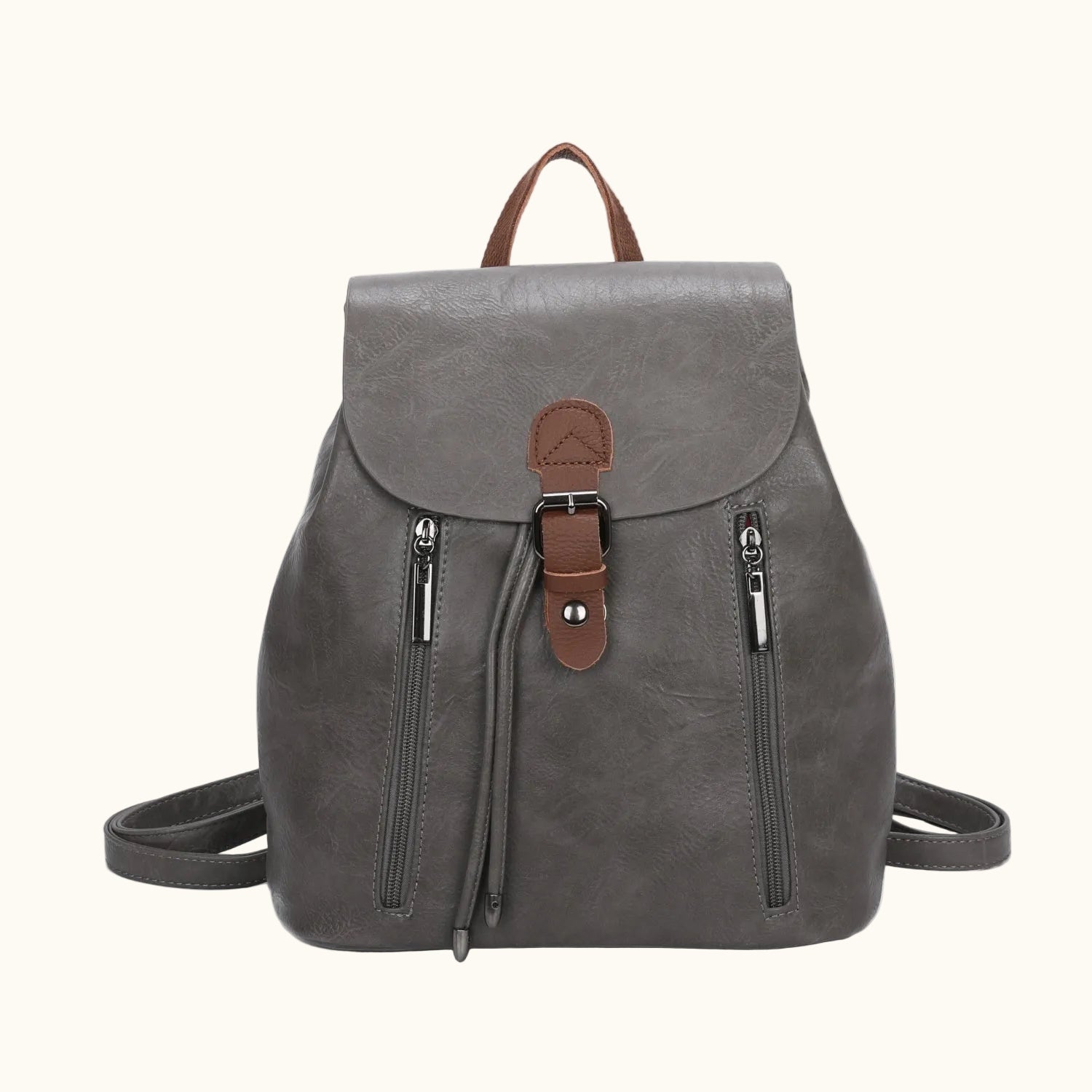 Gray backpack with brown straps and buckle on a white background