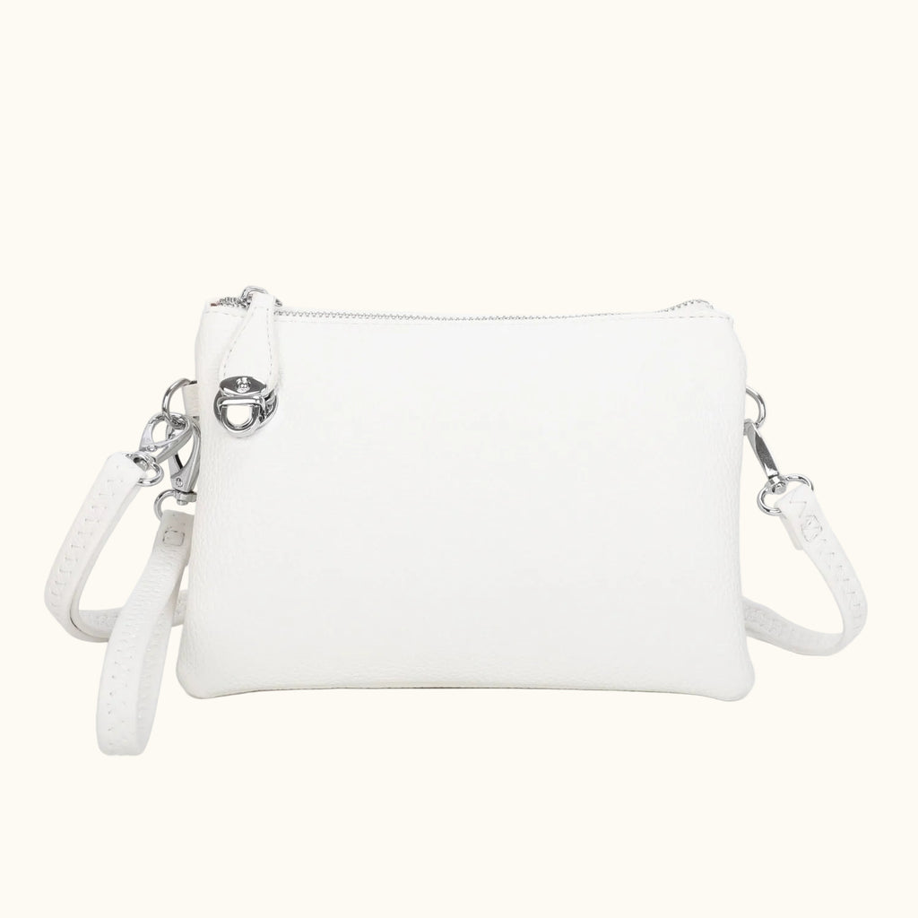 White handbag with a strap on a white background