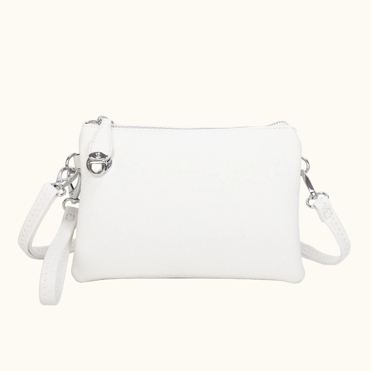 White handbag with a strap on a white background