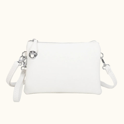 White handbag with a strap on a white background