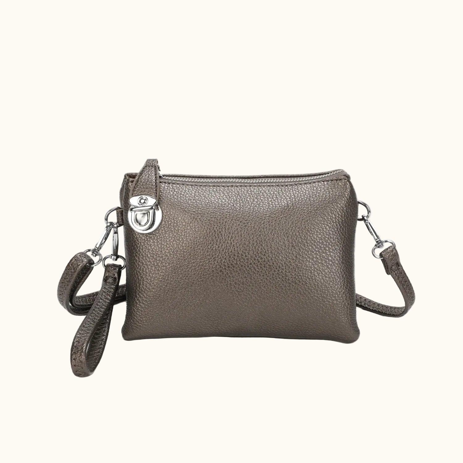 Gray leather crossbody bag with a strap on a white background