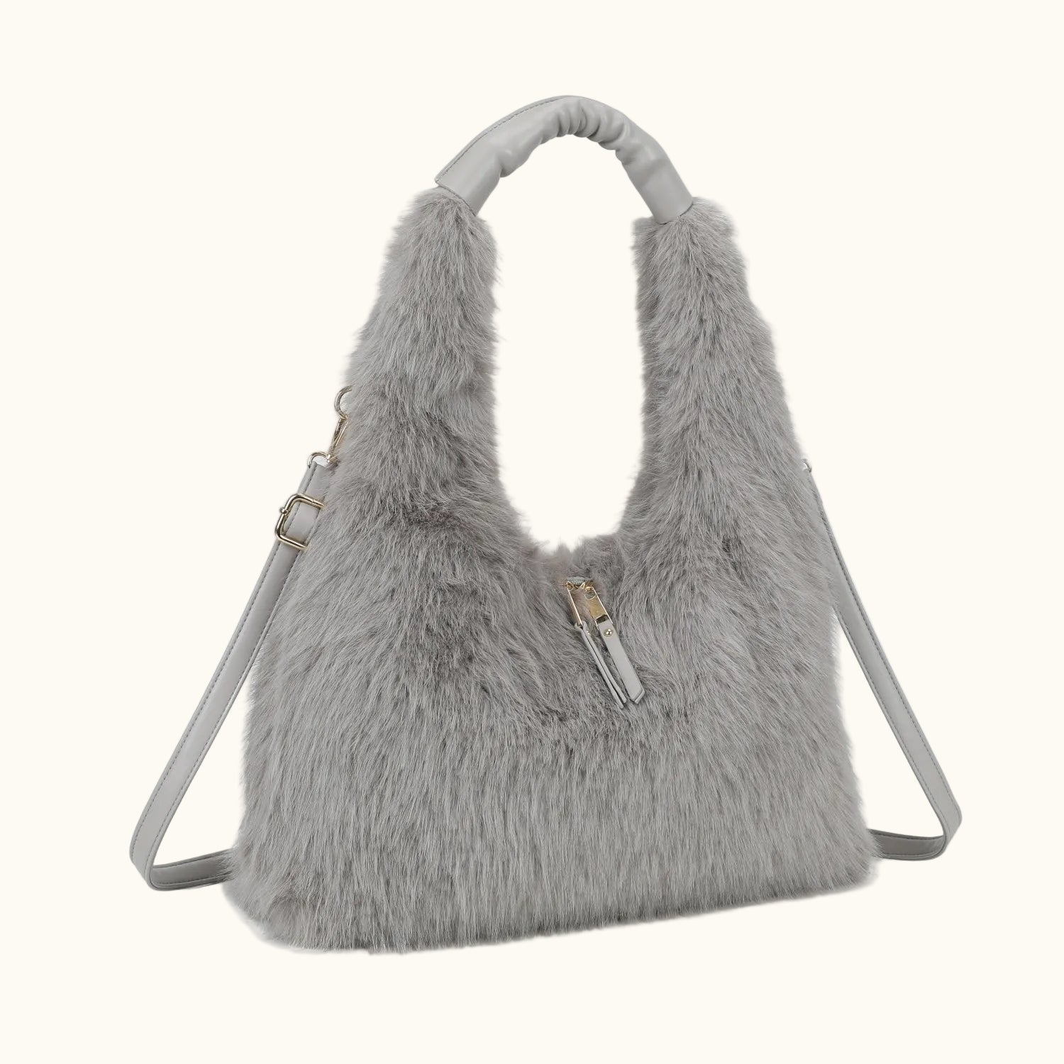 Gray fluffy handbag with a strap on a white background