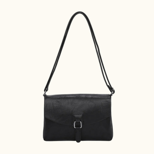 Black handbag with a strap on a white background