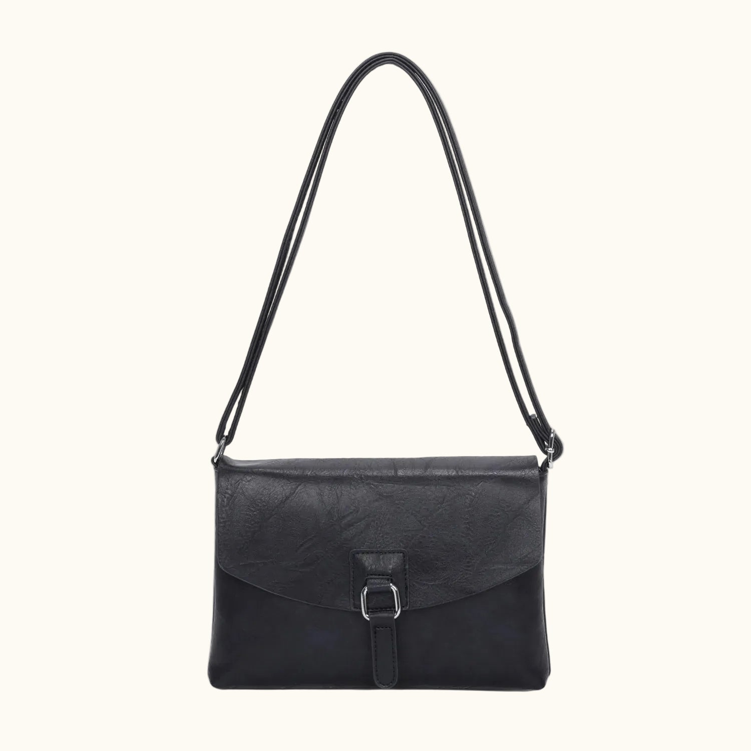 Black leather handbag with a strap on a white background