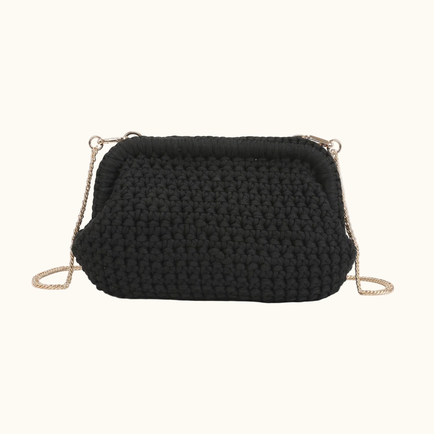 Black knitted handbag with a chain strap on a white background