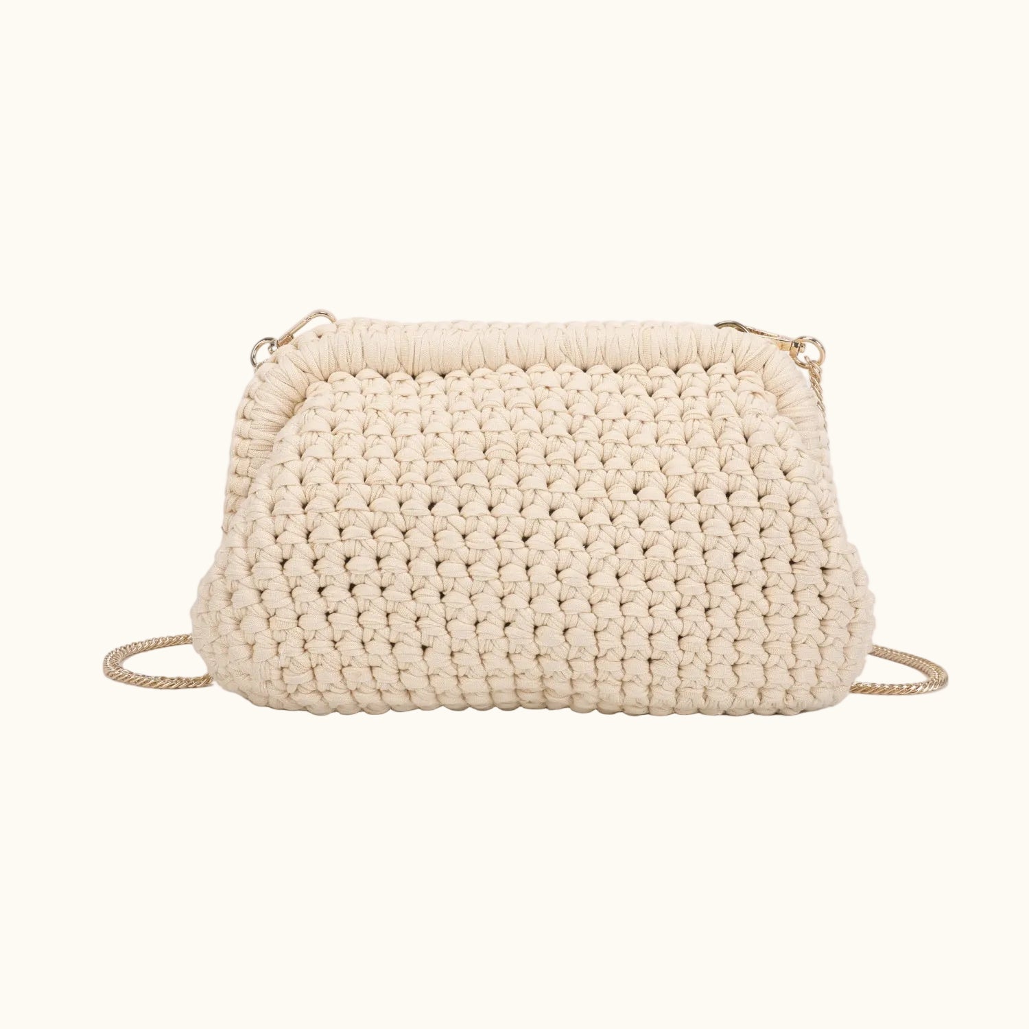 Beige woven handbag on a white background