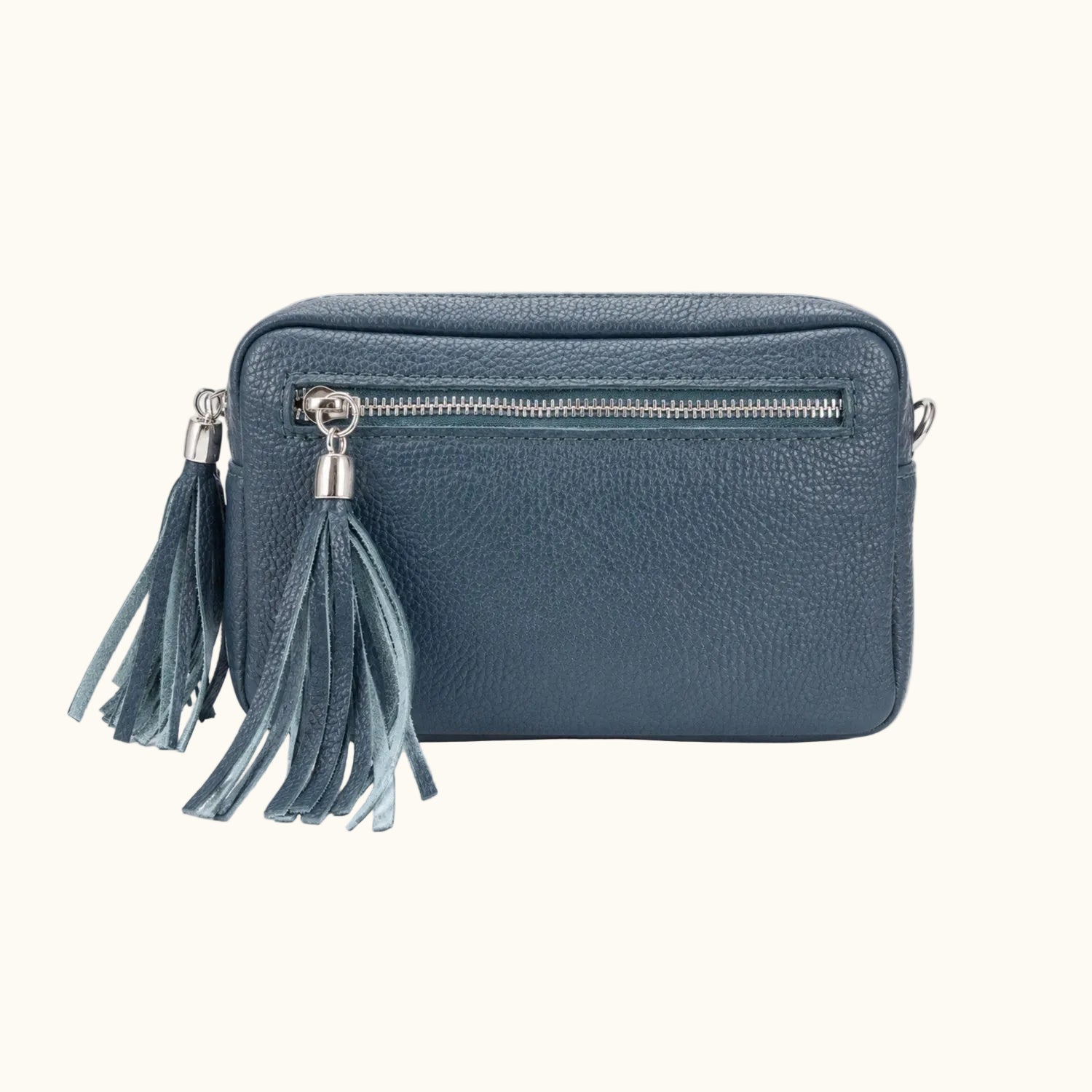 Blue handbag with tassels on a white background