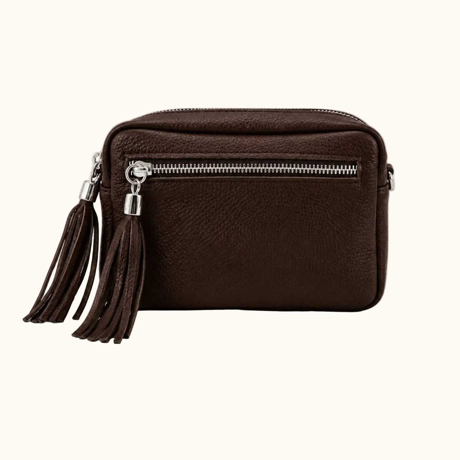 Brown leather bag with a tassel on a white background
