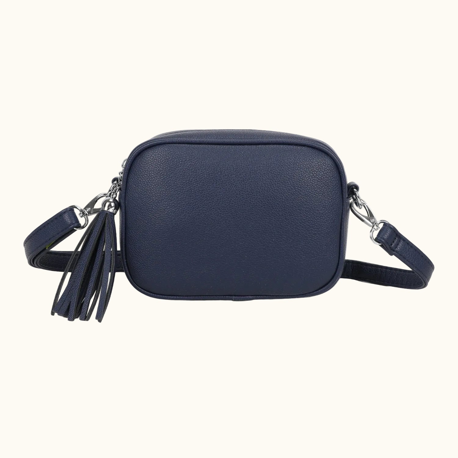 Navy blue crossbody bag with tassel on a white background