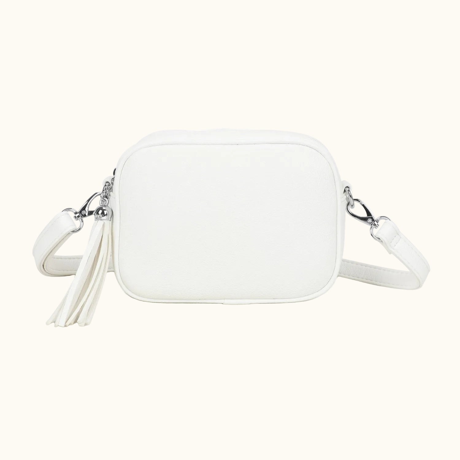 White crossbody bag with a strap on a white background