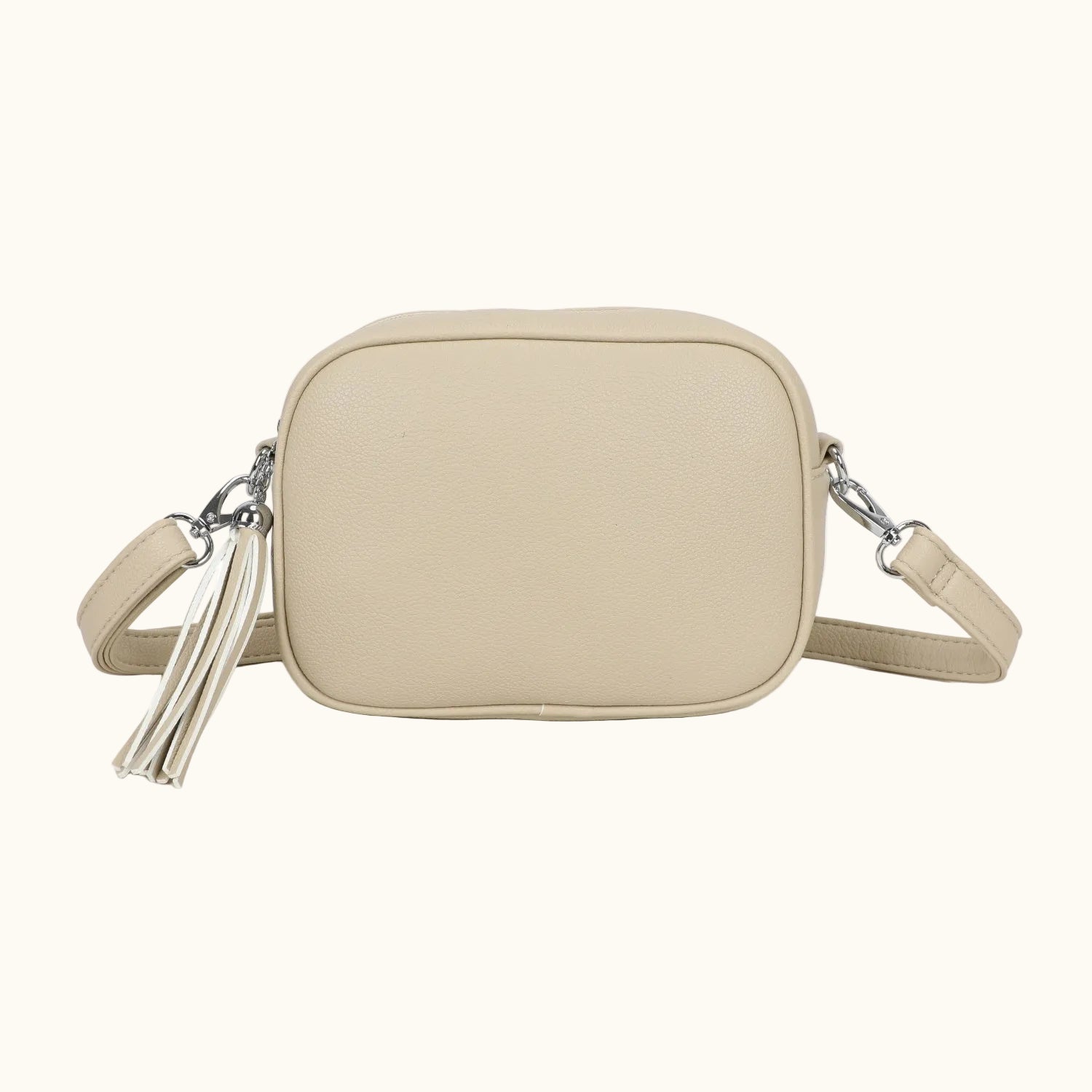 Beige crossbody bag with chain detail on a white background