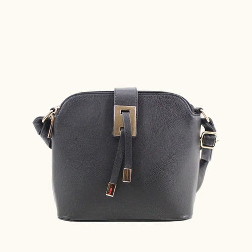 Black handbag with gold accents on a white background