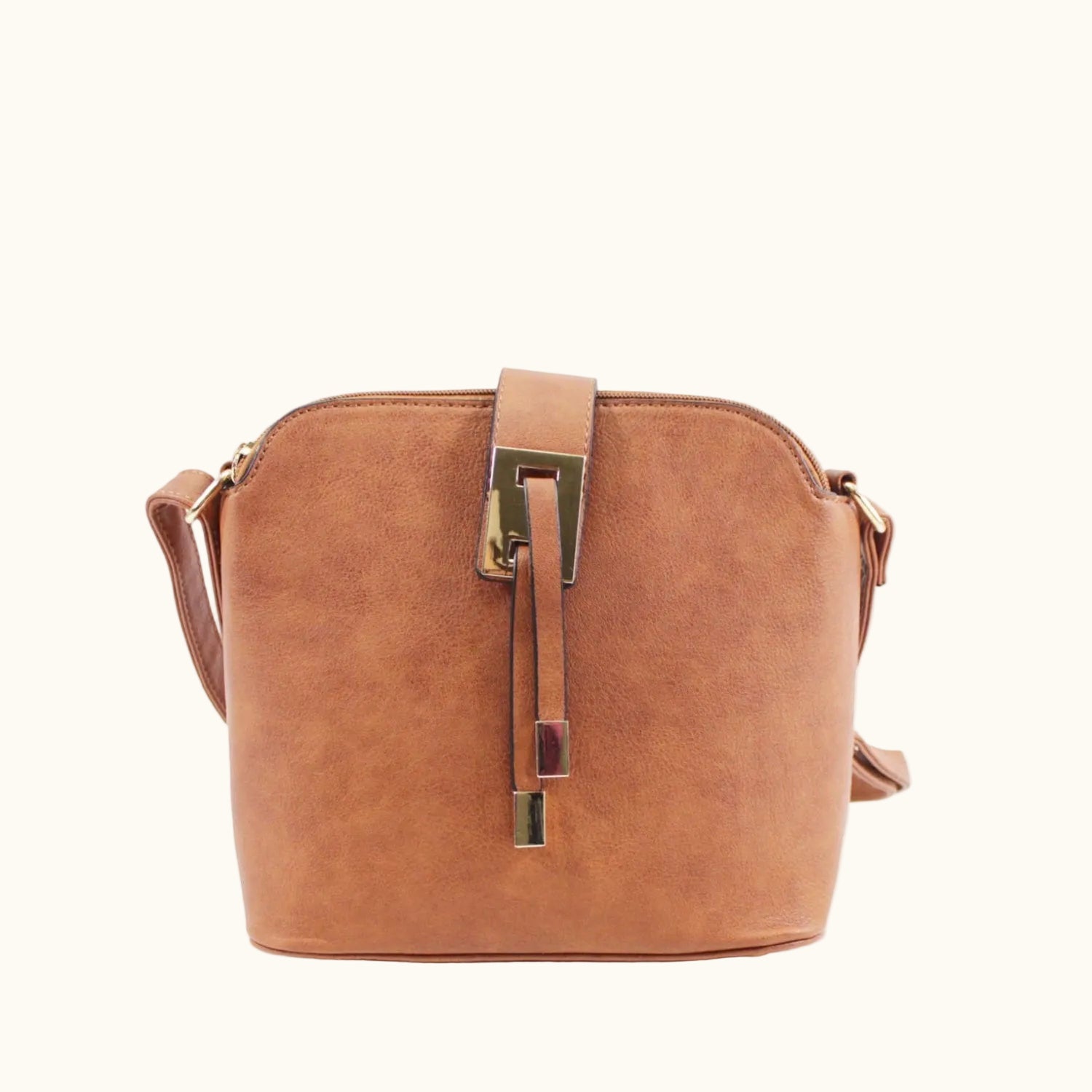 Brown leather handbag with gold accents on a white background