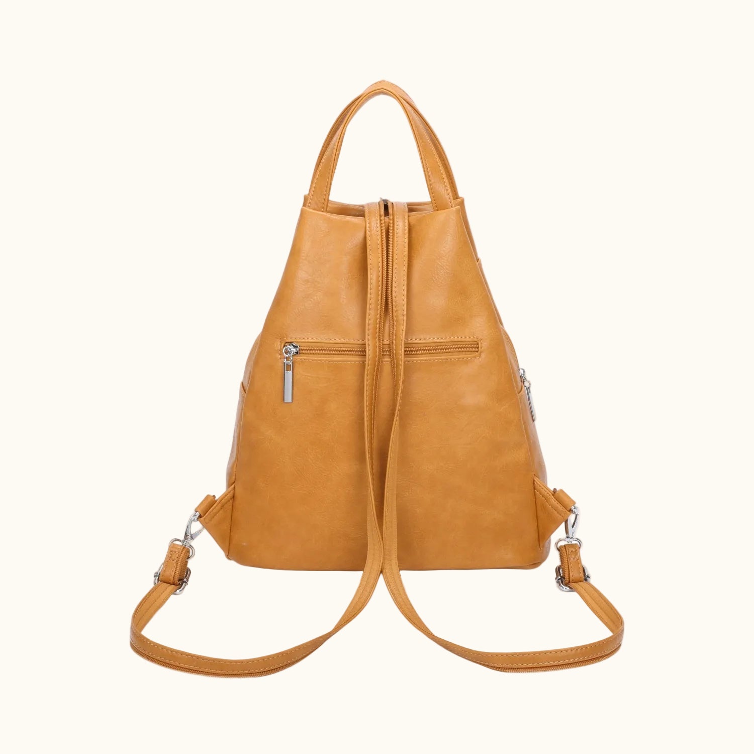 Brown leather backpack on a white background