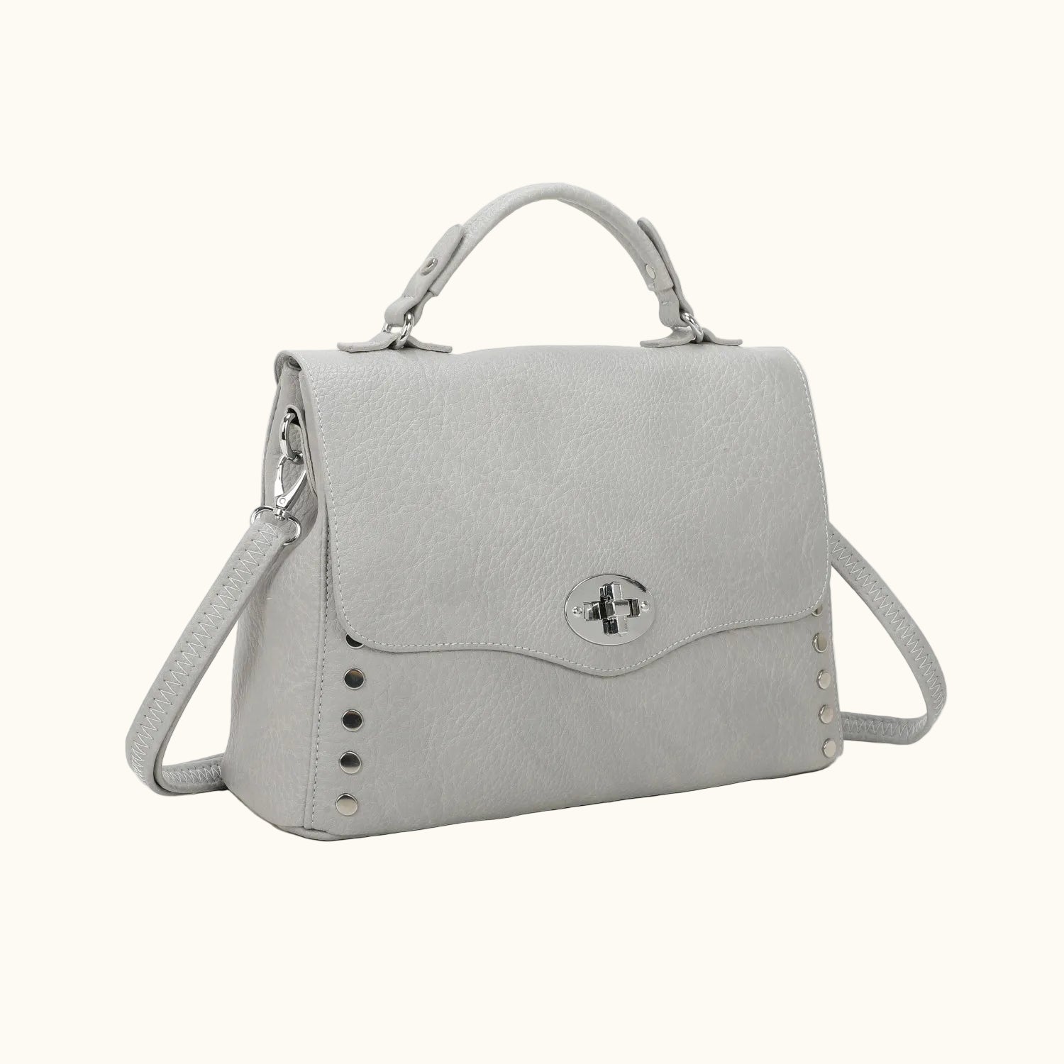 Gray handbag with a silver clasp on a white background