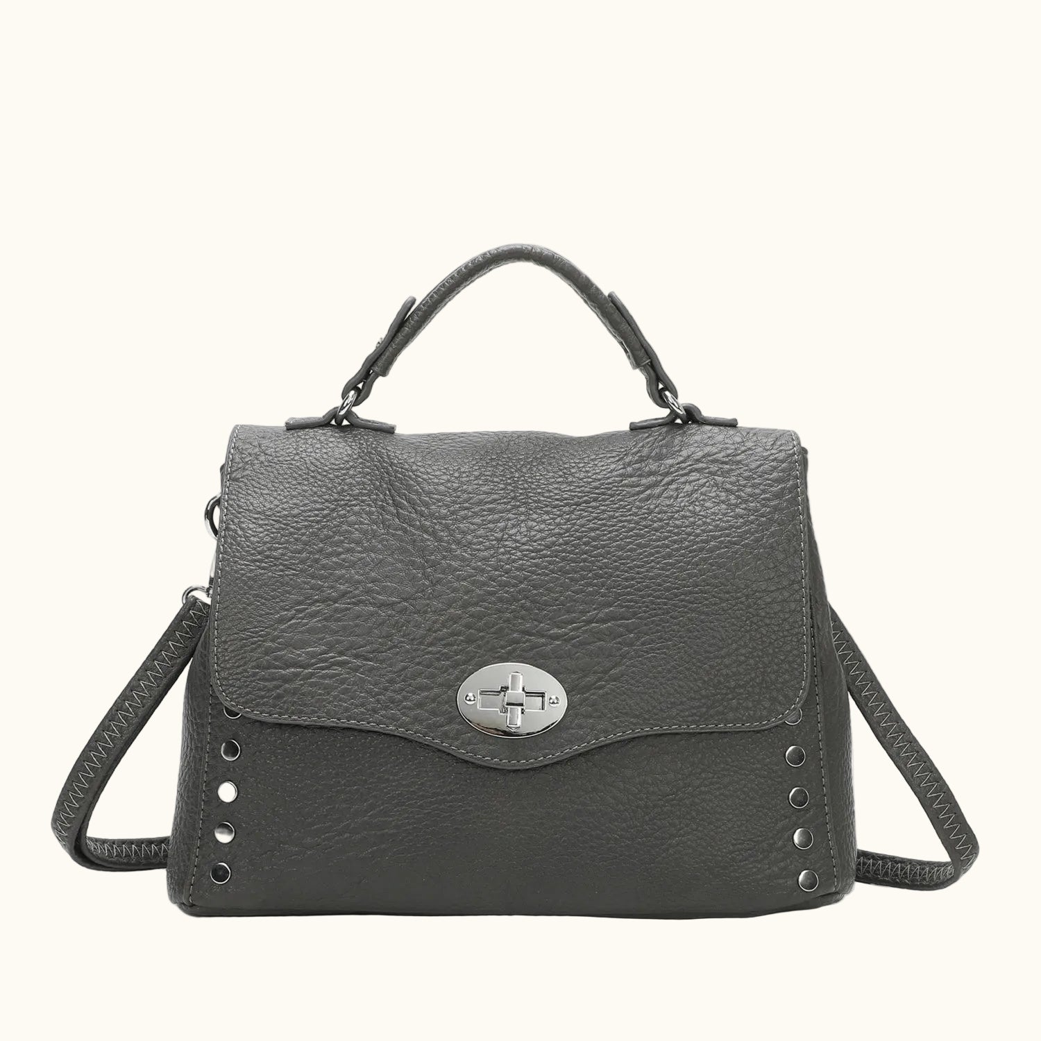 Gray handbag with a silver clasp on a white background