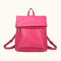 Pink backpack on a white background