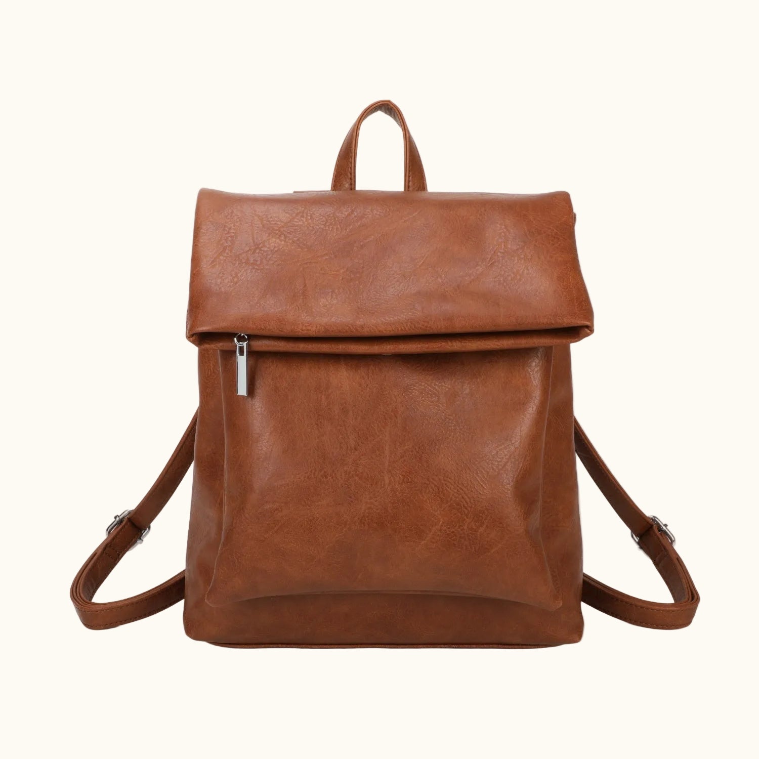 Brown leather backpack on a white background