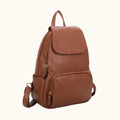 Brown leather backpack on a white background