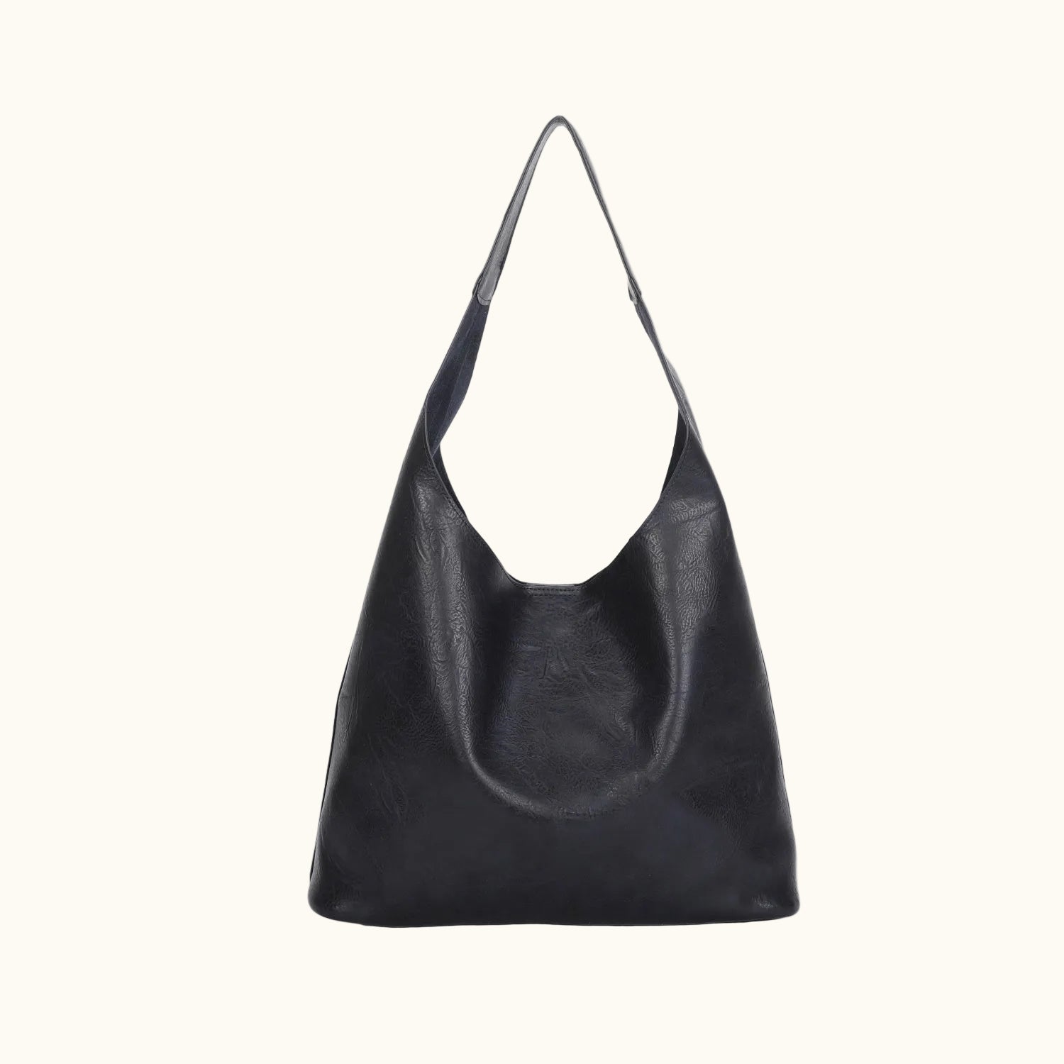 Black leather handbag on a white background