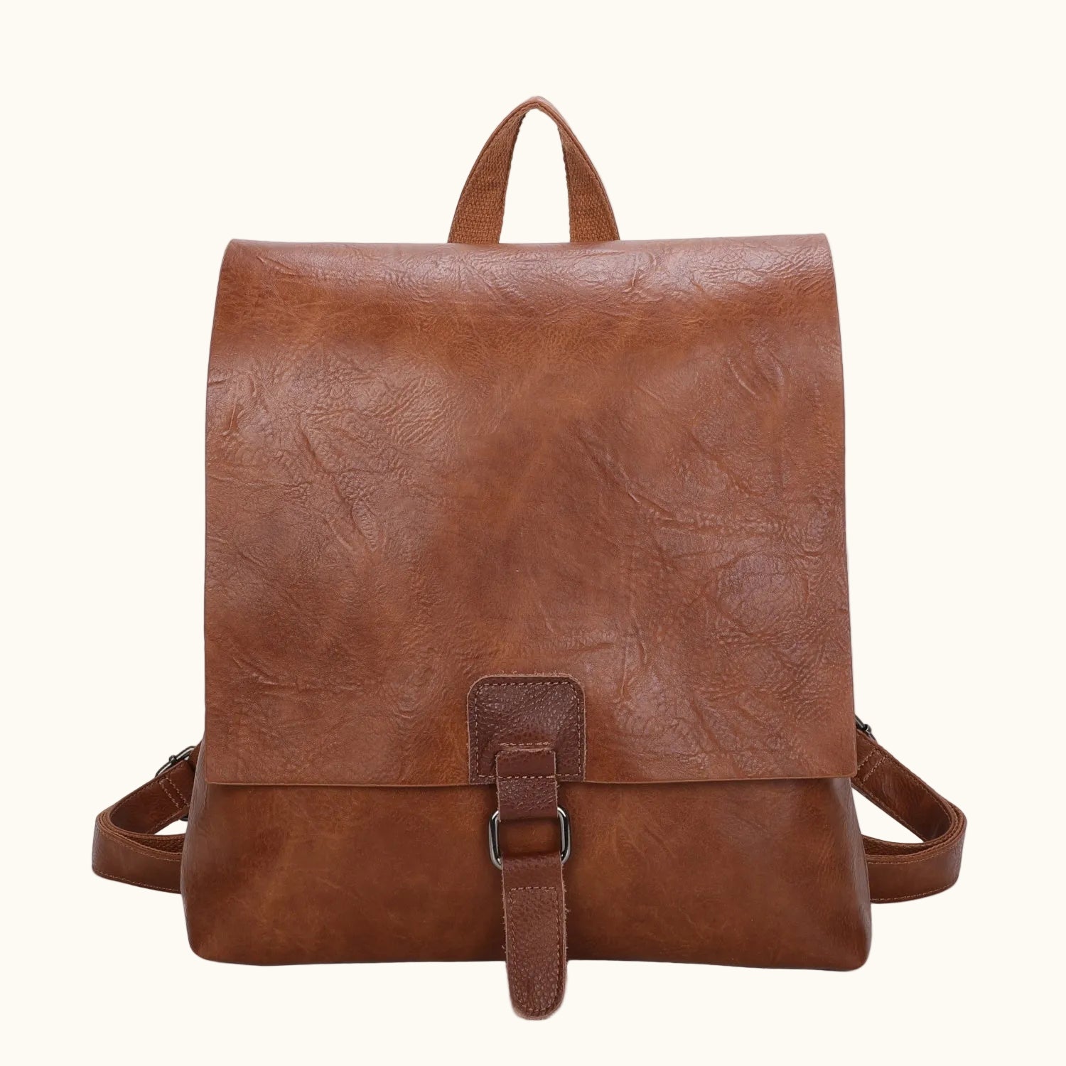 Brown leather backpack on a white background