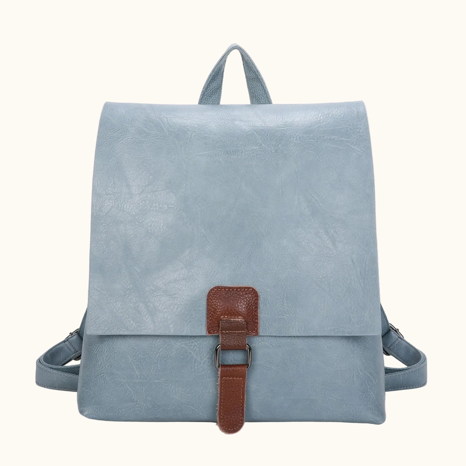Light blue backpack with a brown strap on a white background