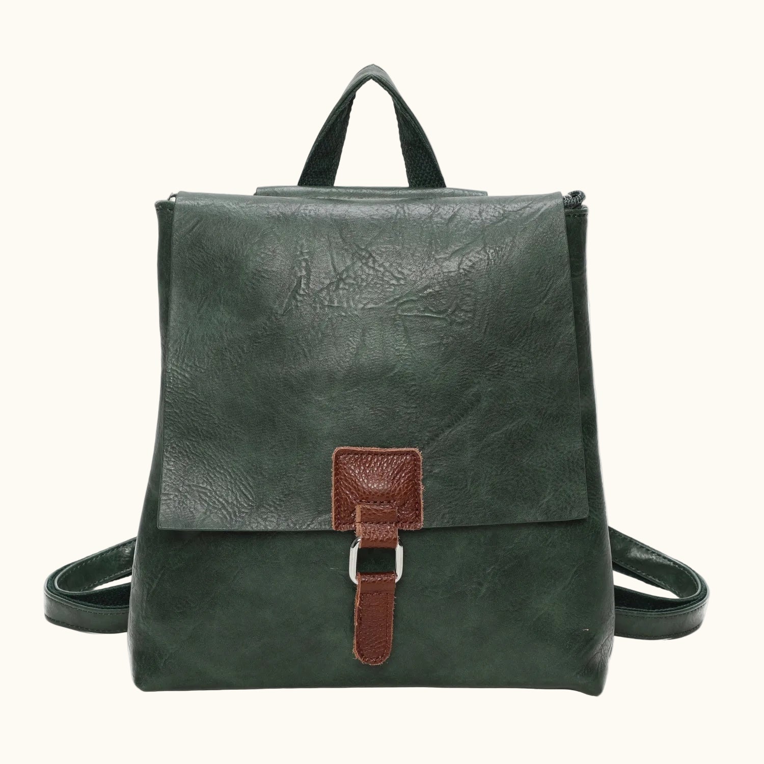Green leather backpack with a brown strap on a white background
