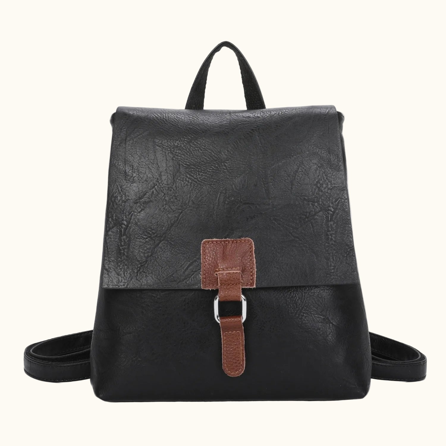 Black leather backpack with a brown buckle on a white background