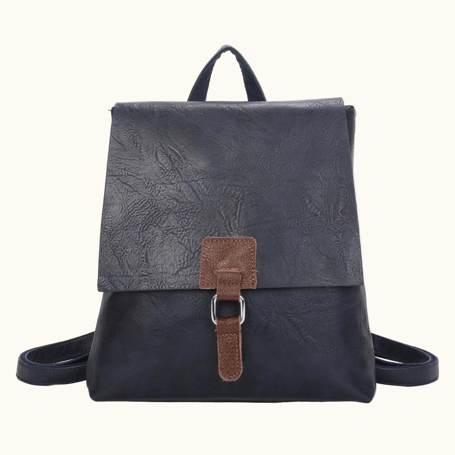 Black leather backpack with floral embossed top section on a white background
