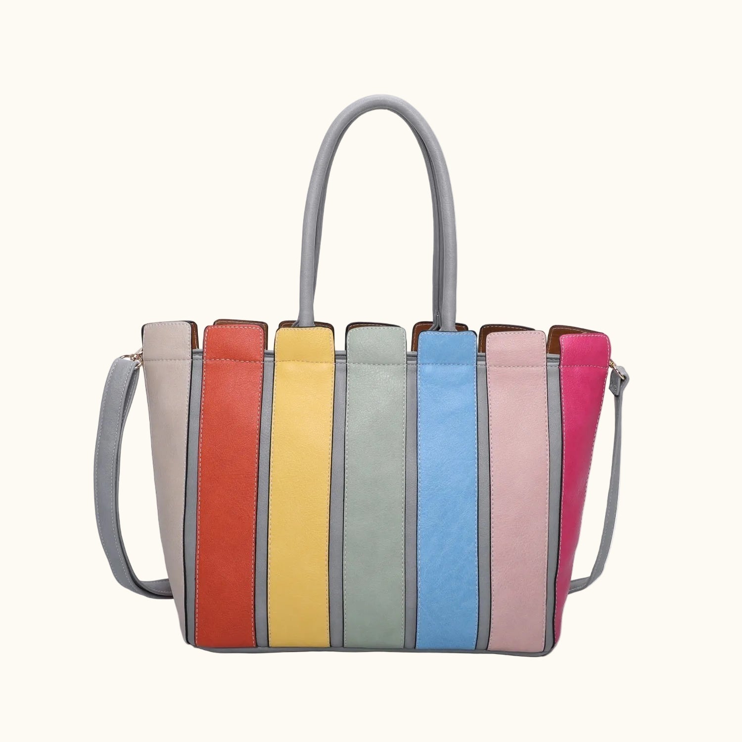 Multicolored striped handbag with gray handles on a white background