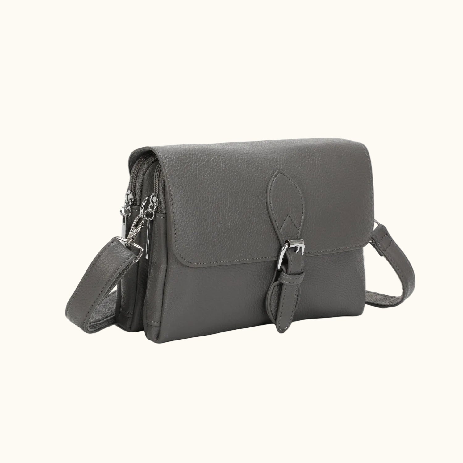 Gray leather crossbody bag on a white background