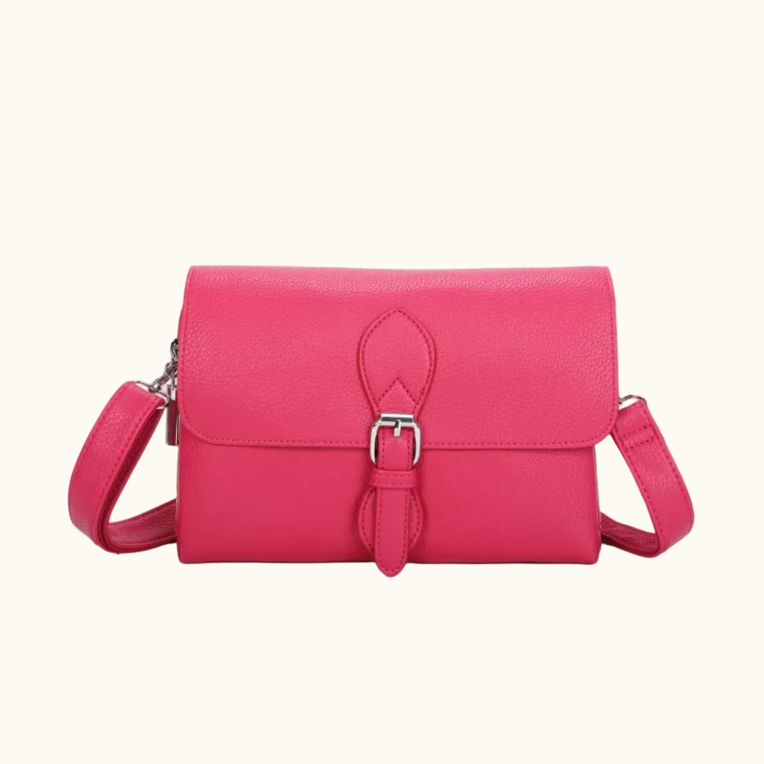 Pink handbag with a strap on a white background