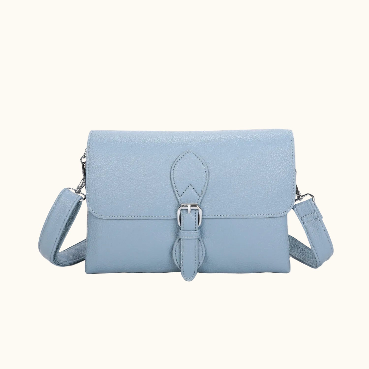 Light blue handbag with a strap on a white background