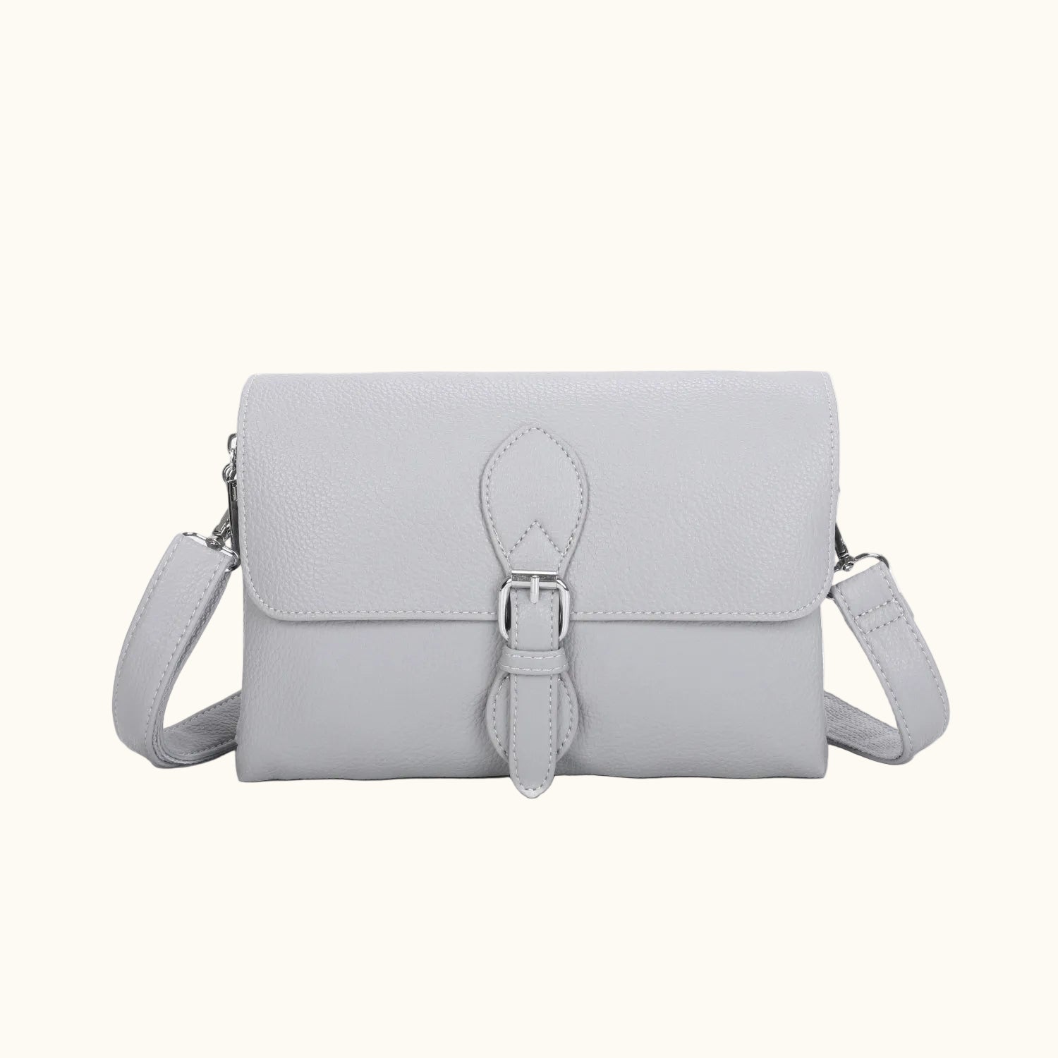 Light gray handbag with a strap on a white background