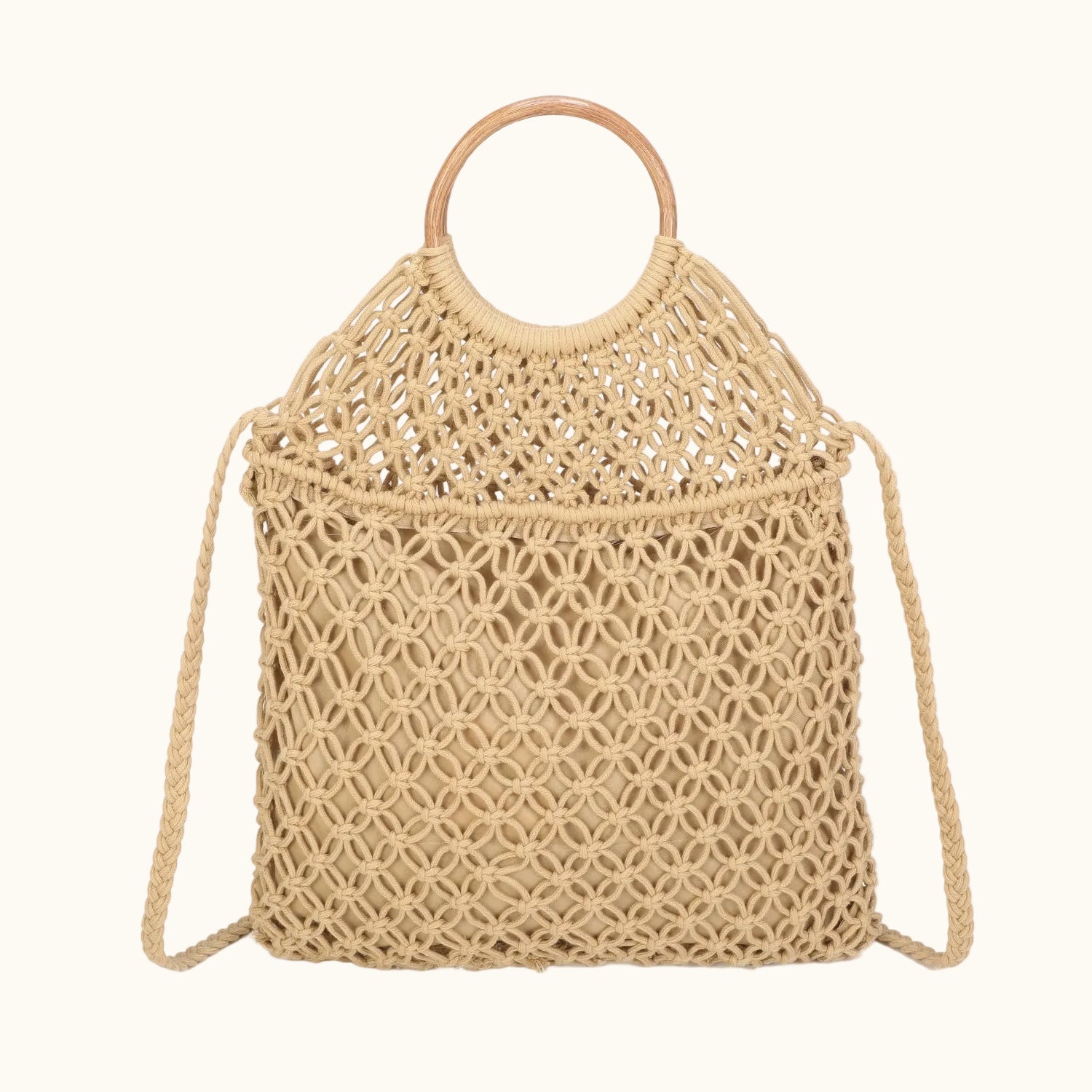 Beige woven handbag with a strap on a white background