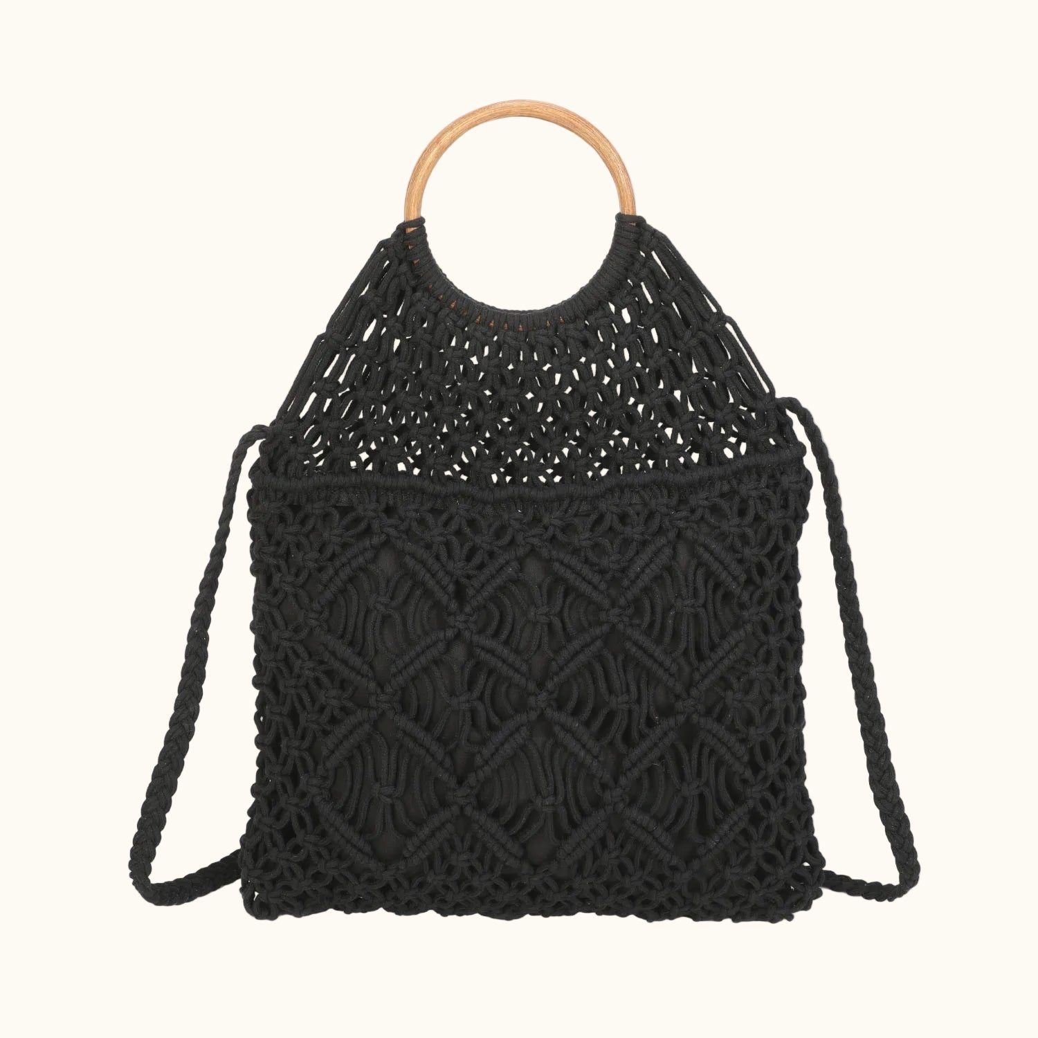 Black woven handbag with wooden handle on a white background